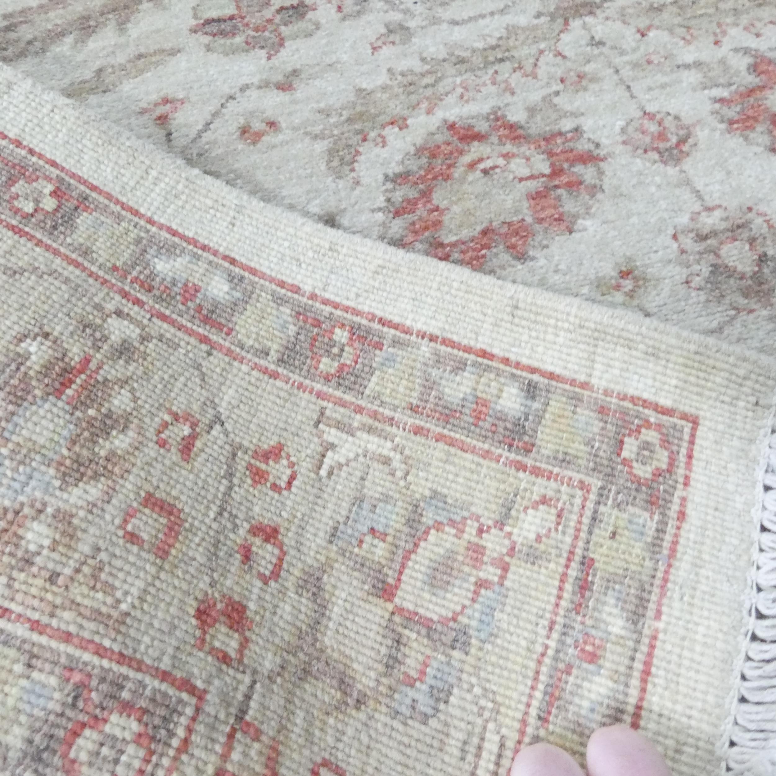 A cream-ground Ziegler rug. 170x130cm. - Image 2 of 2