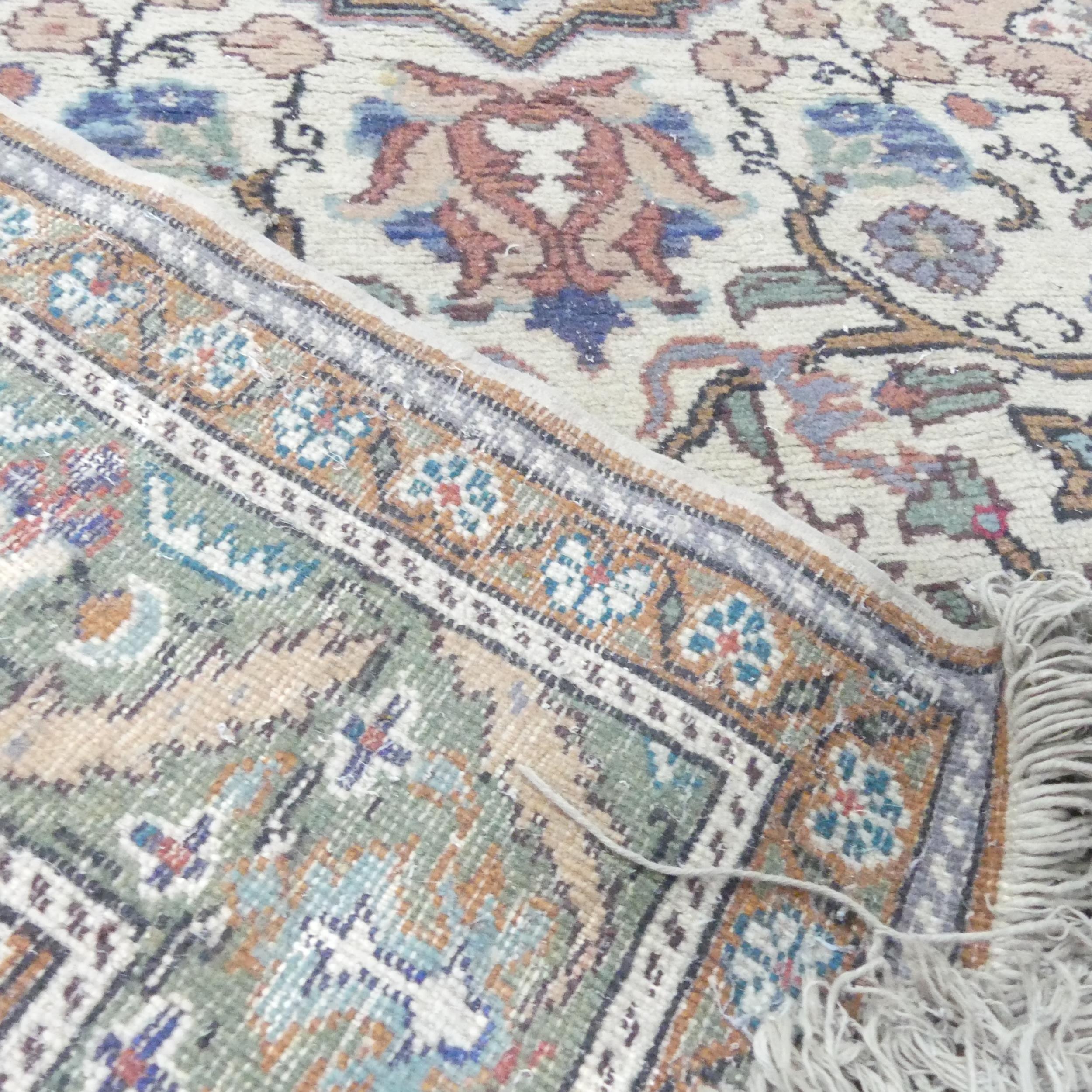 A handmade wool on cotton Kashan rug. 220x154cm. - Image 2 of 2