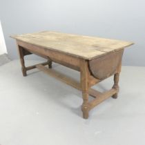A French oak Petrine / dough bin with removable plank table top, raised on turned legs with H-shaped