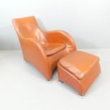 GERARD VAN DER BERG - A Montis Loge designer leather lounge chair and footstool. current RRP ca £