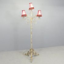 A mid-century Hollywood Regency wrought iron standard lamp with LED bulbs. Height to highest bayonet