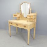 J.R. CROSS FOR DALSTON CABINET WORKS - A Victorian pine dressing table, with raised