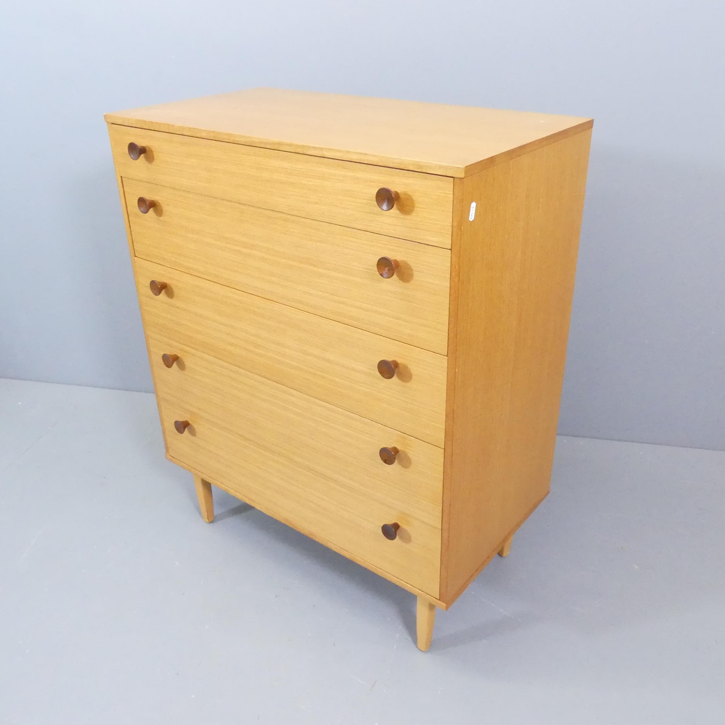 A mid-century teak chest of five long drawers. 82x101x45cm. Good condition. Drawers open and close
