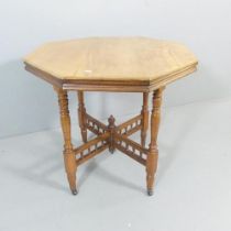 A Victorian mahogany octagonal occasional table. 73x71cm. Top has a filled split and is faded.