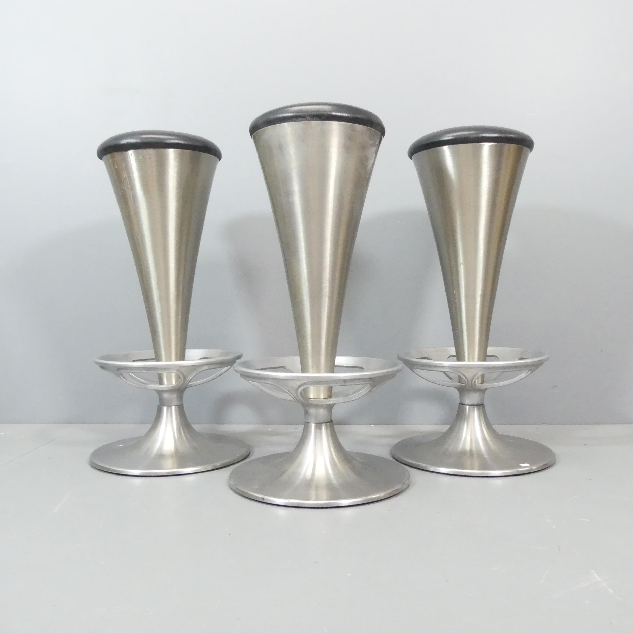 A set of 3 mid-century design conical steel bar stools with tulip shaped bases. H - 82cm.