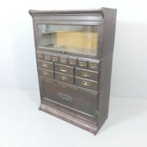 An early 20th century Globe-Wernicke style modular secretaire bookcase in five sections, to