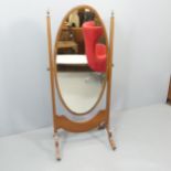 A 19th century mahogany and ebony-strung cheval mirror. 69x150x50cm.