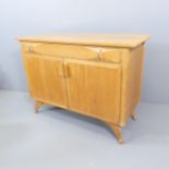ANDREW J MILNE FOR HEAL'S - a Mid-Century blonde wood sideboard, circa 1952, frieze drawer with