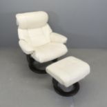 A modern Ekornes style faux-leather upholstered swivel lounge chair, with matching footstool,