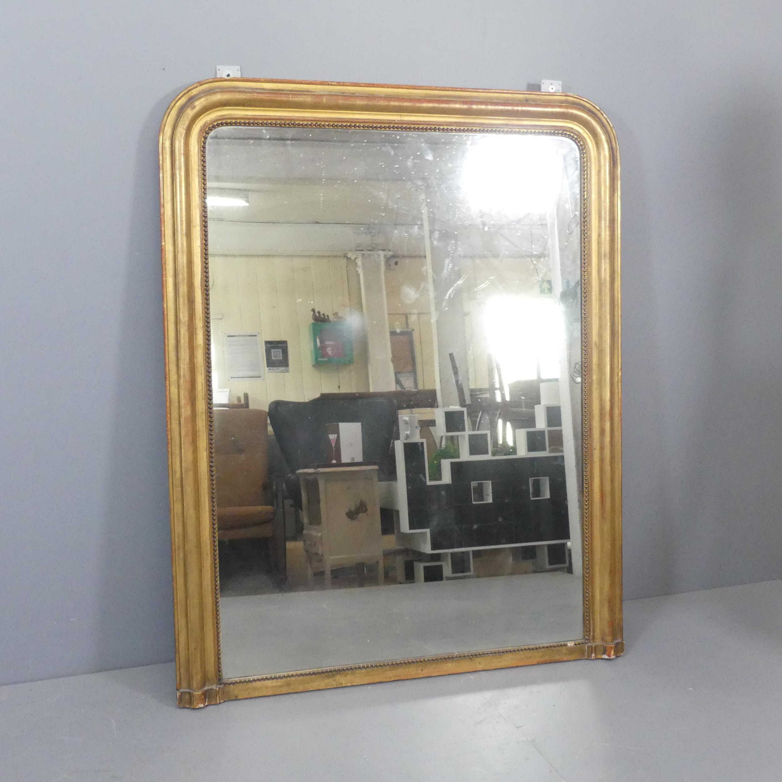 A 19th century giltwood and gesso framed over-mantle mirror. 118x148cm.