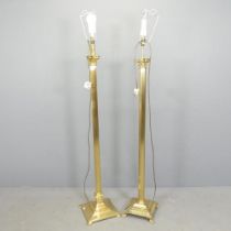 Two similar brass Corinthian column standard lamps. Tallest height to bayonet 142cm.