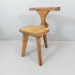 A 1960s French oak brutalist smoking or reading chair.