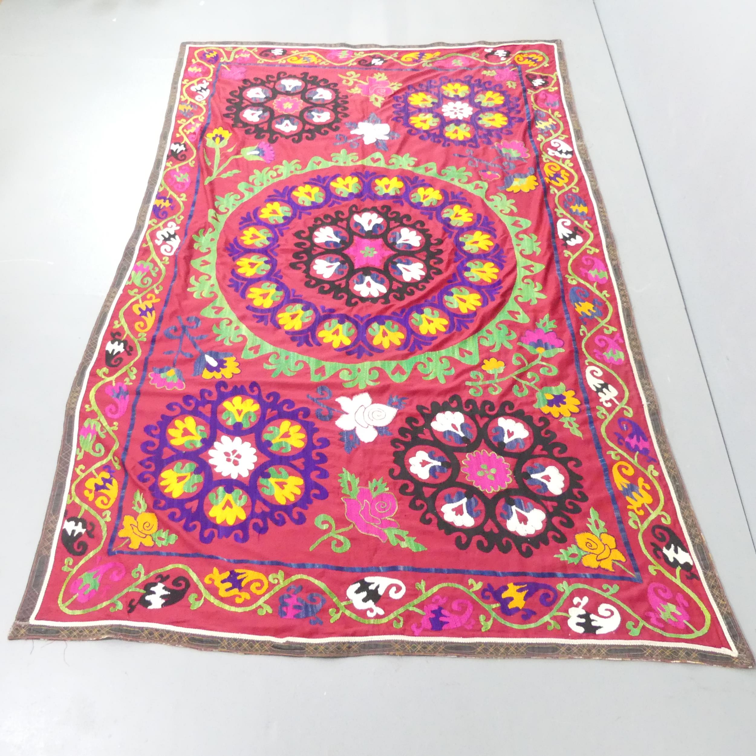 A Turkish embroidered wall-hanging. 230x146cm.