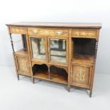 A Victorian rosewood and satinwood strung sideboard in the manner of Maple & Co., with inlaid