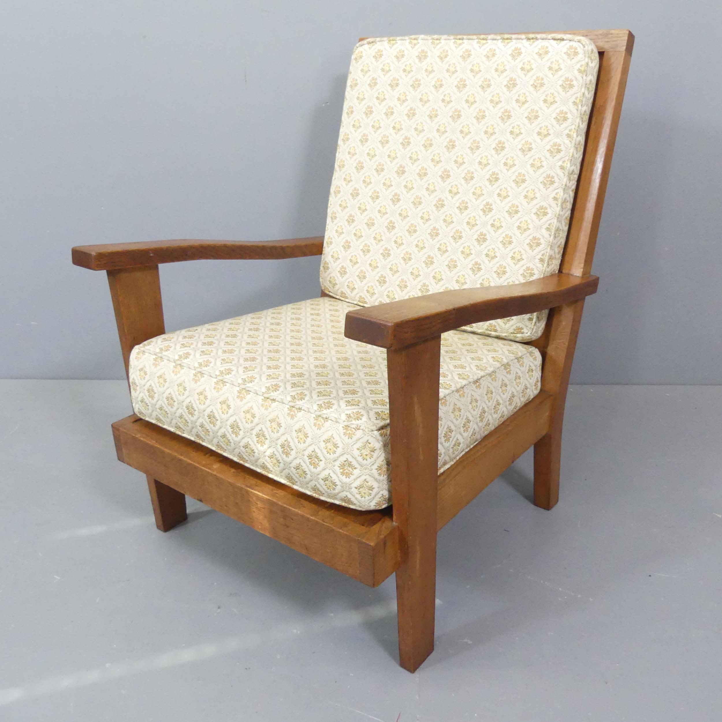 A Brynmawr Furniture Makers oak Arts & Crafts fireside chair, circa 1935, with provenance. WITH