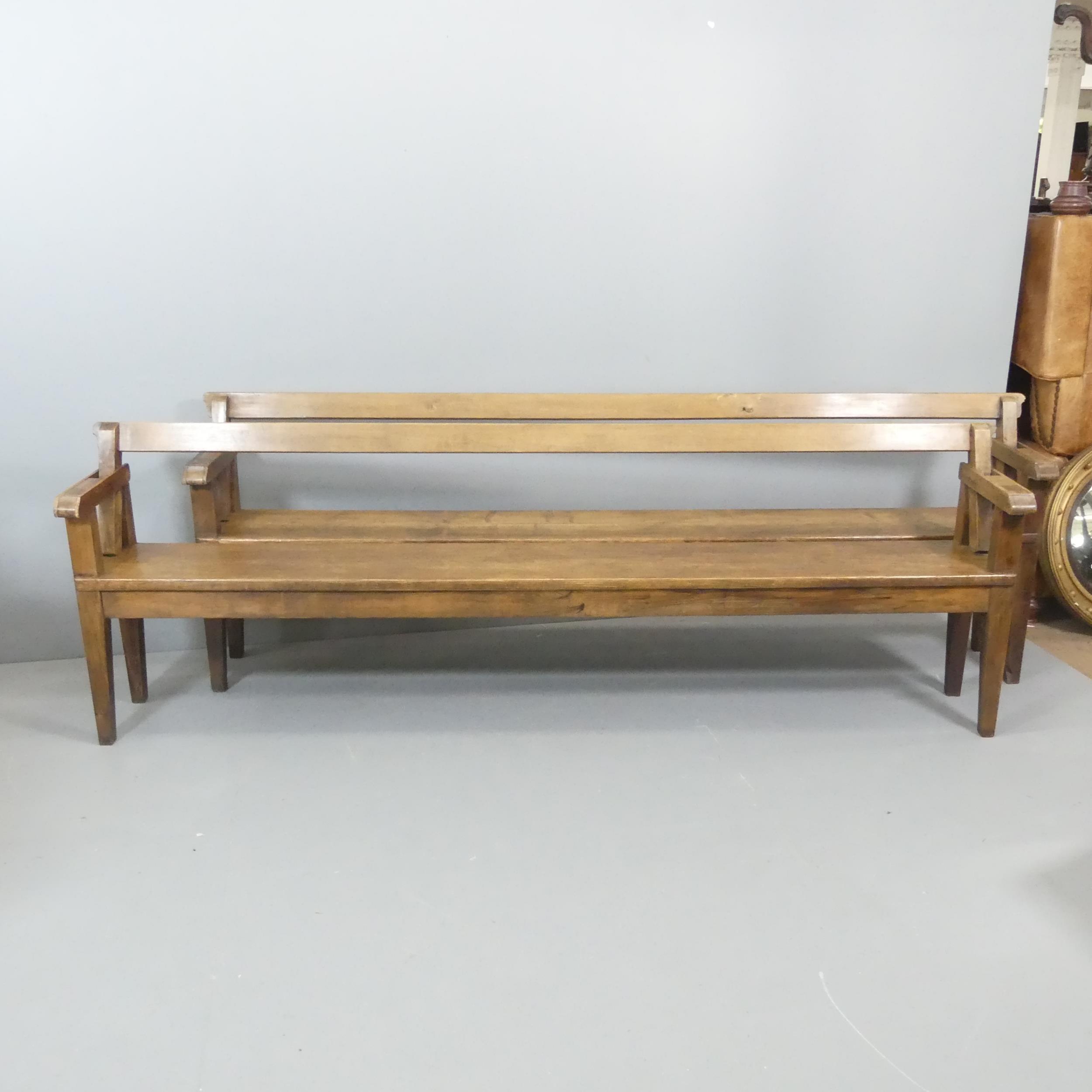 A pair of late 19th century stained pine benches, with adjustable backrests. Overall -