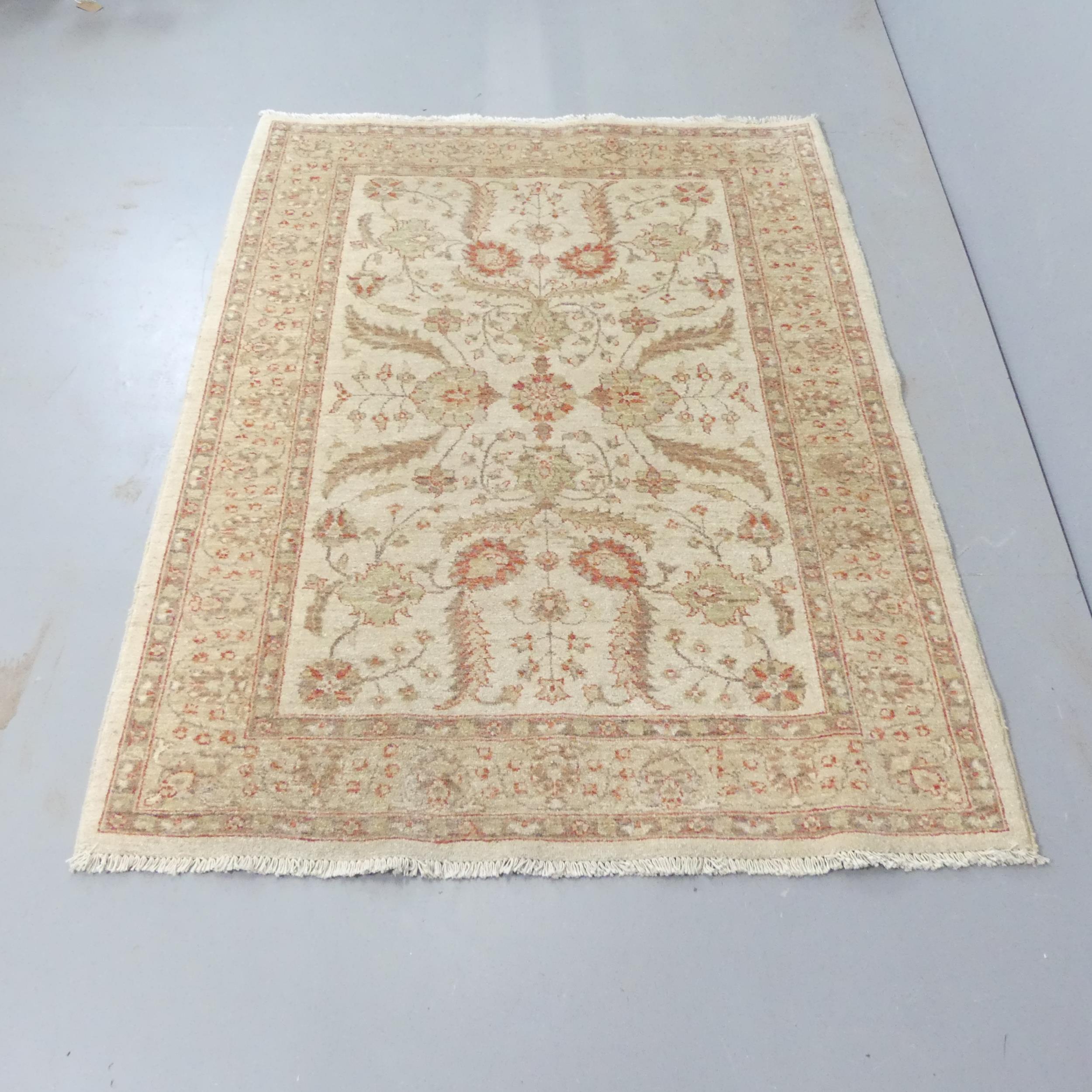 A cream-ground Ziegler rug. 170x130cm.