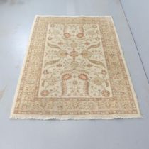 A cream-ground Ziegler rug. 170x130cm.
