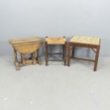 A small oak dropleaf occasional table, 56x46x28cm, a tapestry-upholstered stool and a rush-seated