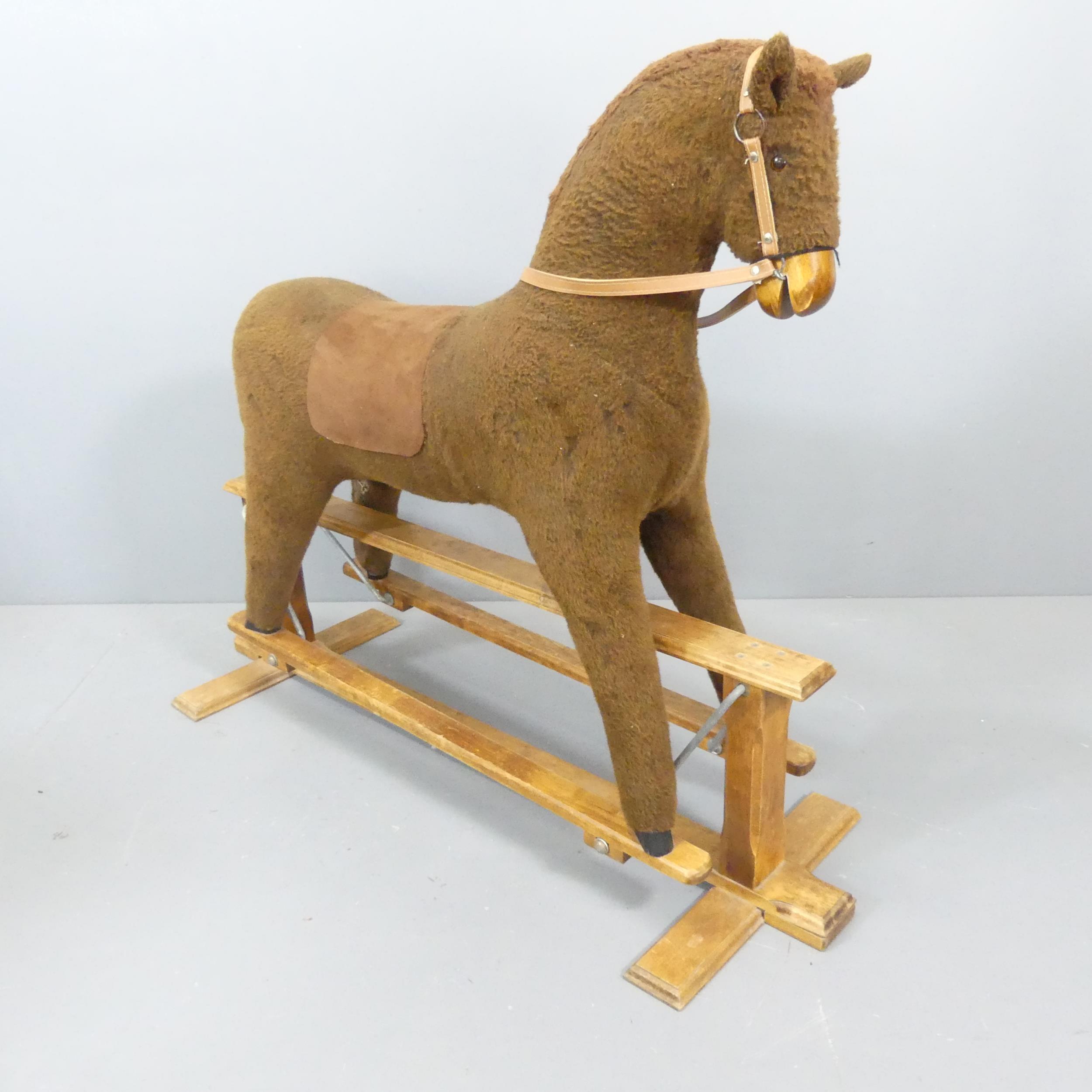 A vintage rocking horse on oak base. Overall 130x108x45cm. - Image 2 of 2