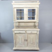 A French oak two-section buffet, with two glazed panelled doors, two drawers and cupboards under.