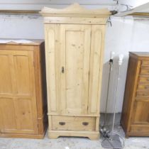 An antique pine 3-section single wardrobe. 88x202x47cm.