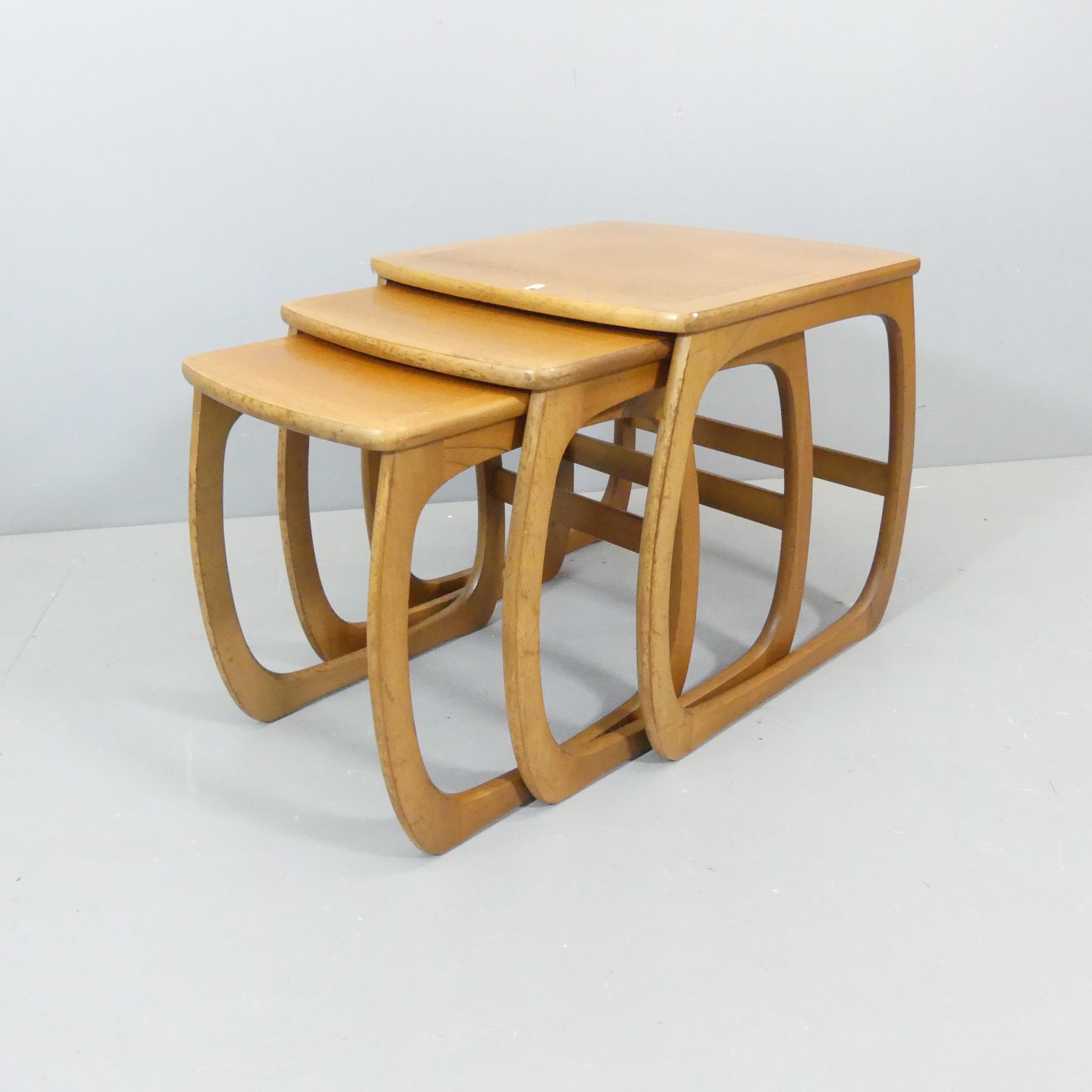 NATHAN - A nest of Burlington tables in teak. Largest - 53x50x48cm.