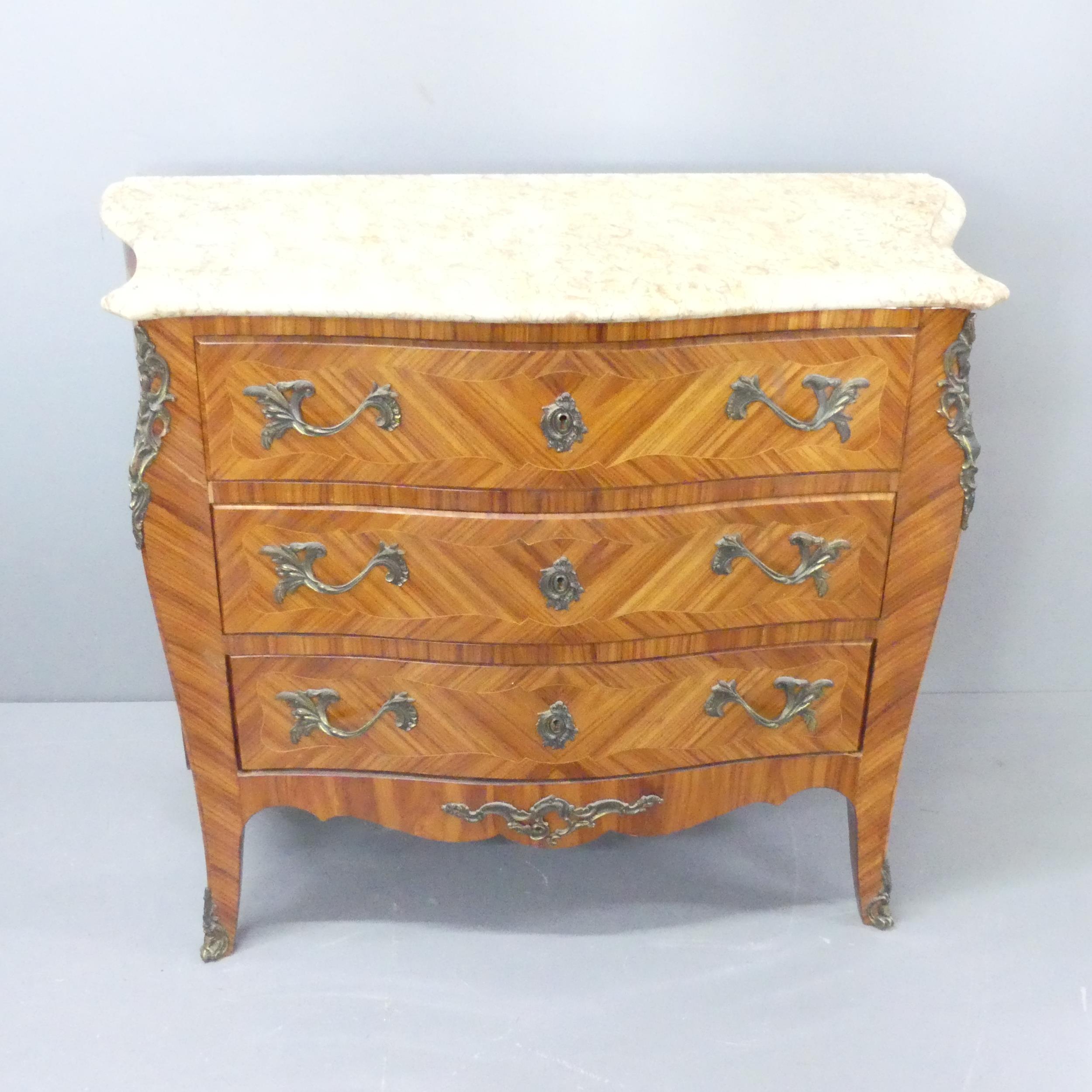 A French kingwood Louis XVI style chest of three drawers with serpentine marble topped. 100x81x46cm
