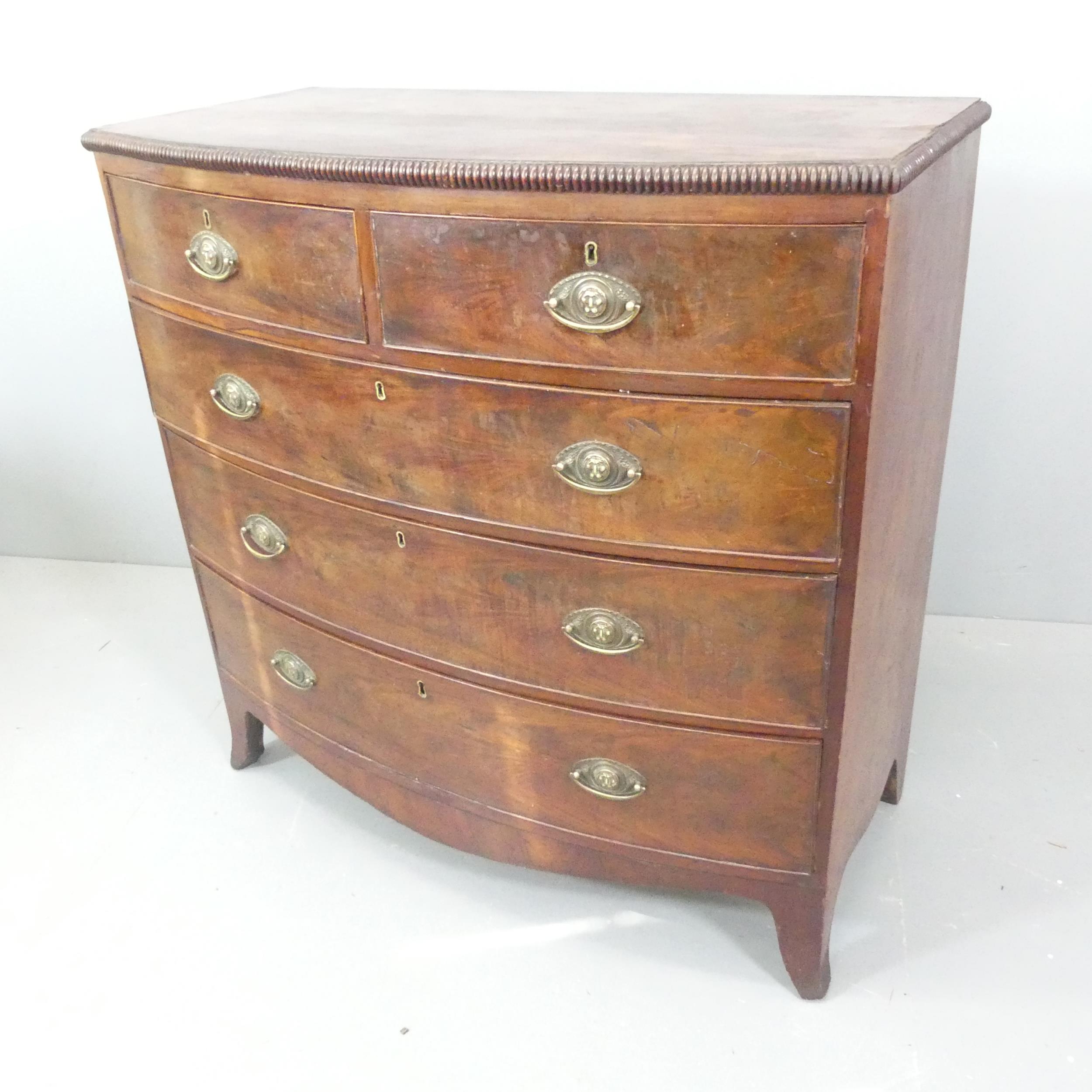 A Georgian mahogany bow-front chest of two short and three long drawers. 107x105x53cm. Both rear