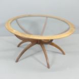 G-PLAN - A mid-century Astro Spider circular coffee table, with inset glass top and teak frame.