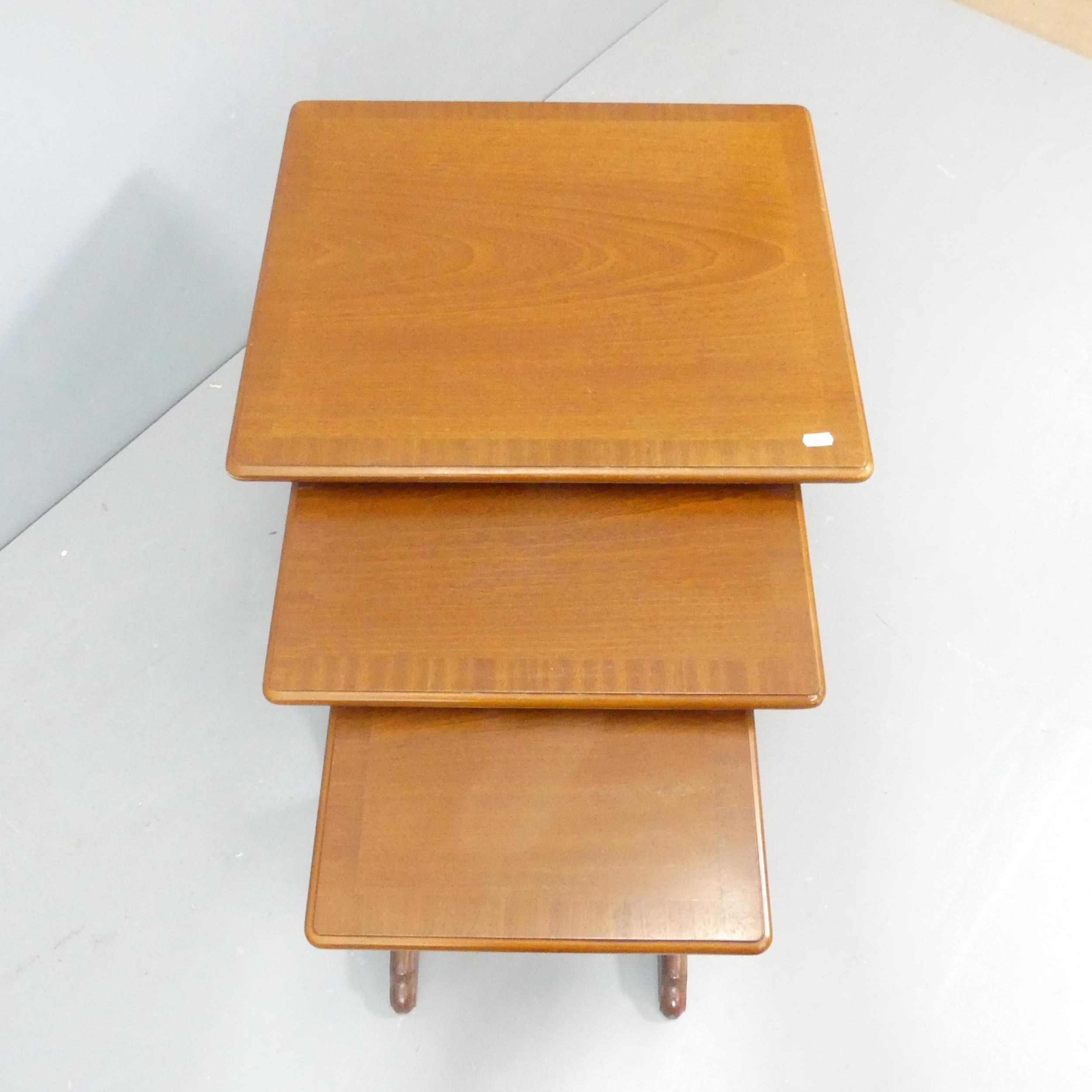 PARKER KNOLL - A teak next of 3 tables., with maker's labels. Largest - 56x49x48cm. - Image 2 of 3
