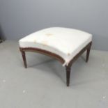 A French mahogany and upholstered concave footstool, for re-upholstery. 68x42x70cm.