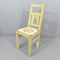 A Moroccan style painted pine chair.