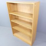 A modern light oak open bookcase with three adjustable shelves. 92x138x31cm.