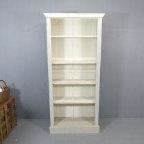 A modern painted pine open bookcase. 100x220x39cm.