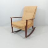 PARKER KNOLL - a mid-century Danish style rocking chair.