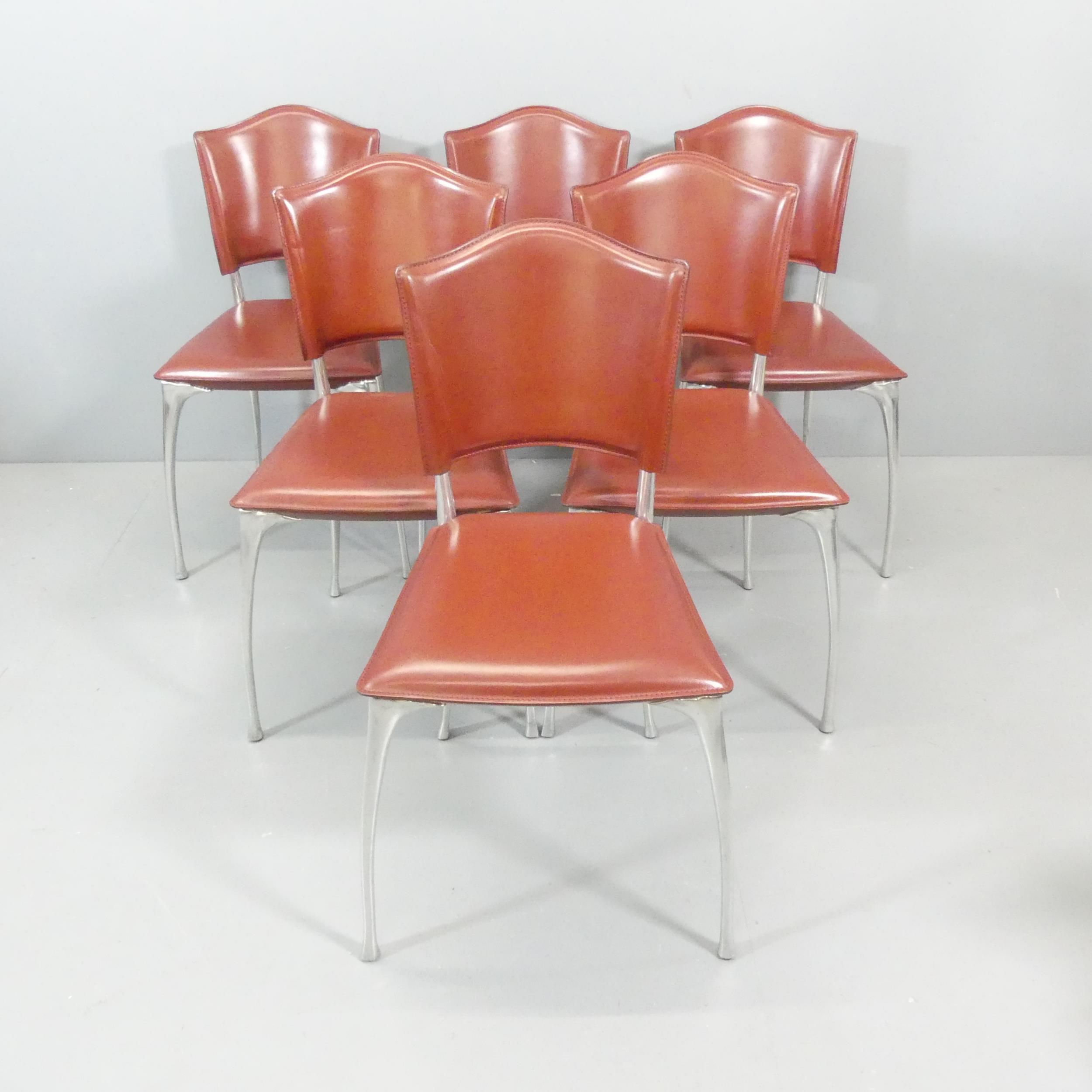 BERNARD DEQUET - A set of 6 1990s French leather and aluminium dining chairs.