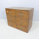 An early 20th century stained pine bank of six drawers. 61x49x31cm.