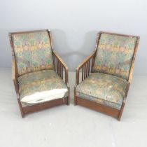 A pair of 1930s Art Deco oak and upholstered lounge chairs. Overall 63x82x82cm, seat 58x35x56cm.