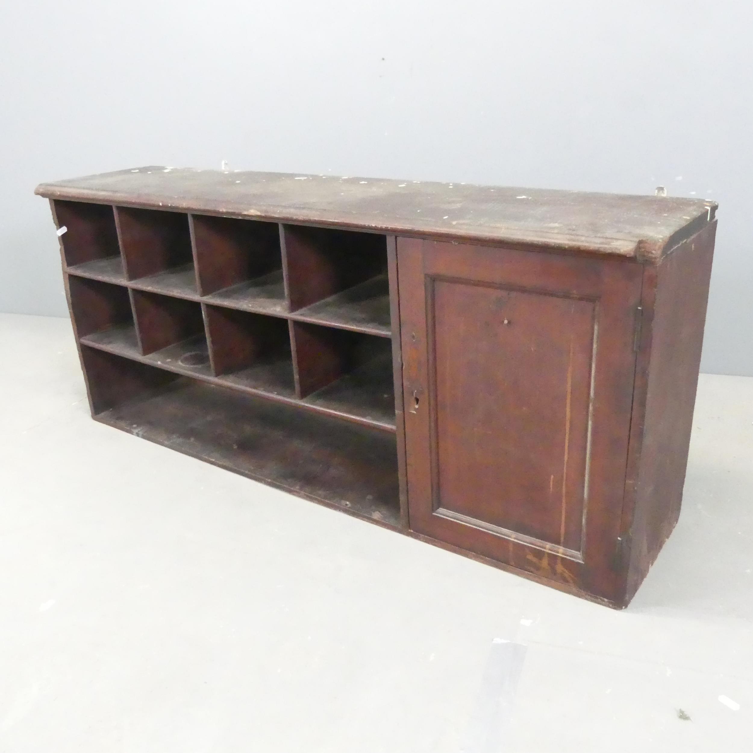 An early 20th century mahogany bank of pigeon holes. 131x56x32cm.