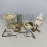 A weathered concrete garden urn with fluted decoration, 31x37cm, a pair of cobbler's anvils, etc.