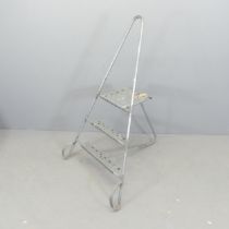A Unistrut aluminium step ladder. Height 128cm. Good used condition. Believed to have come from
