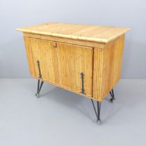 A vintage teak and bamboo clad cocktail cabinet. 87x75x44cm.