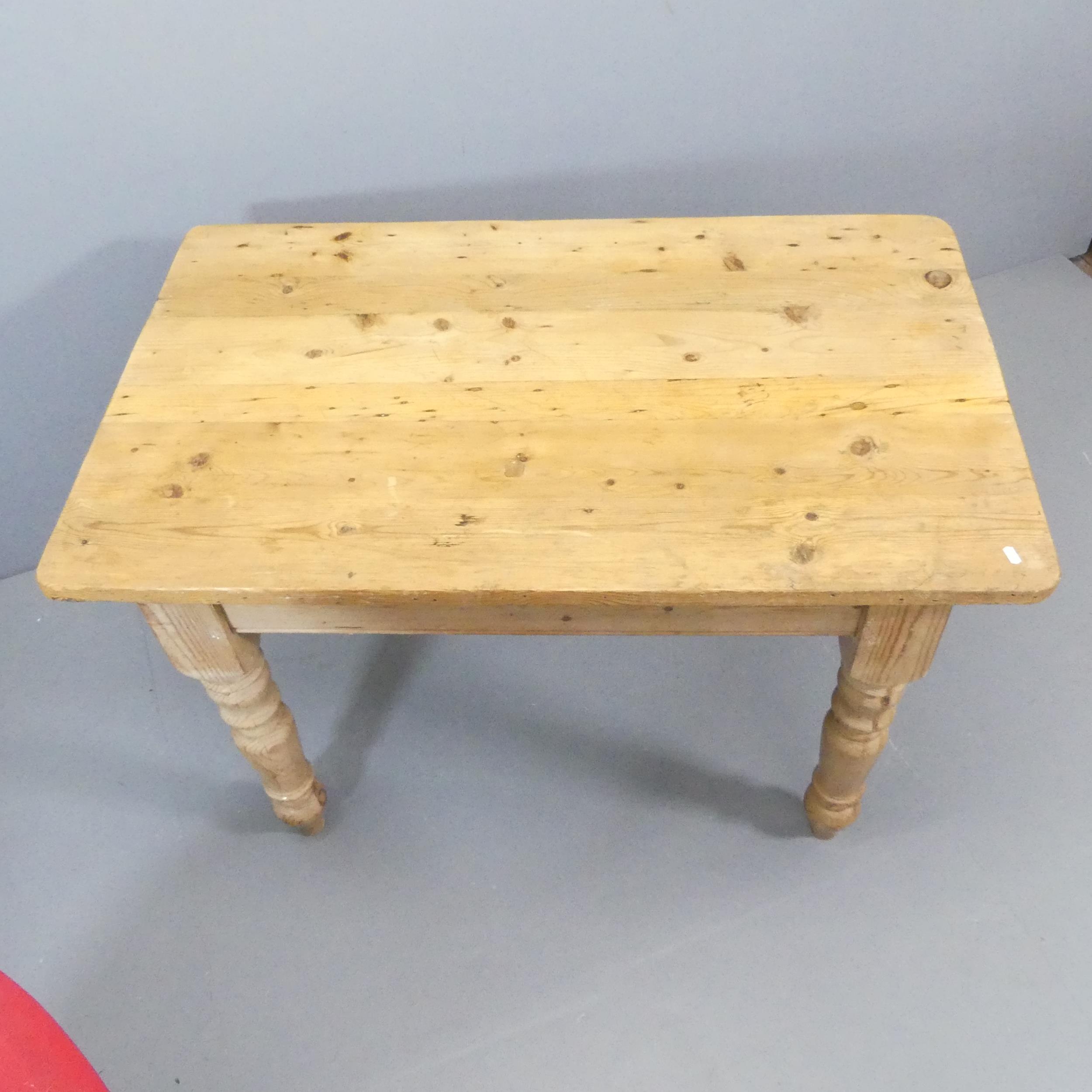 A pine farmhouse kitchen table. 120x77x74cm. - Image 2 of 2