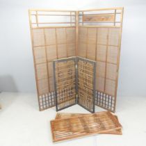Two Japanese bi-fold screens, largest panel size 87x172cm, and a pair of sliding doors. (3).