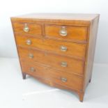 A 19th century Mahogany and satinwood and ebony strung chest of two short and three long drawers.