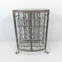 A 1940s wrought metal wine cabinet. 66x84x41cm.