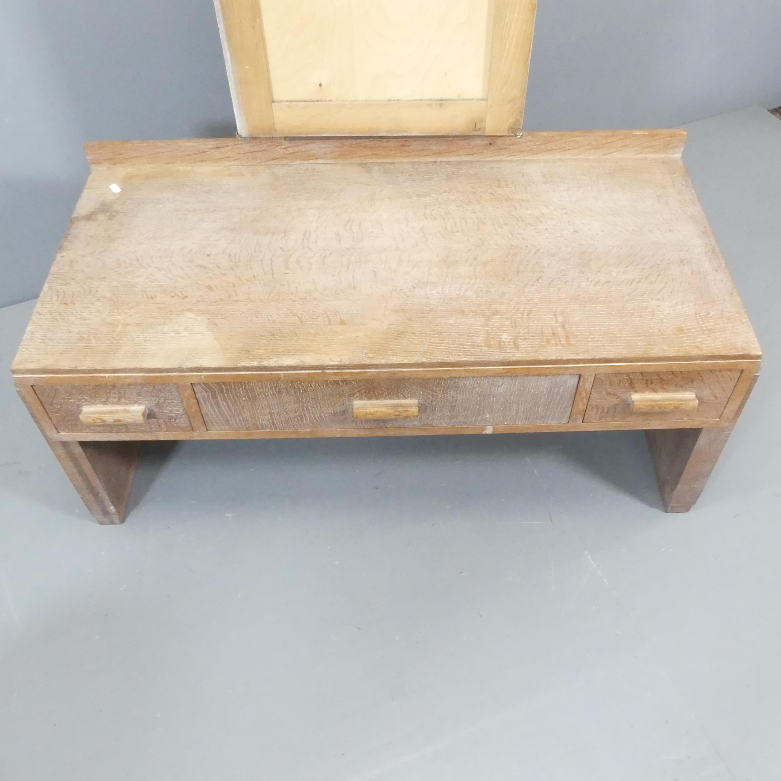 HEALS - A limed oak dressing table, with raised back, three drawers and maker's label. 107x154x49cm. - Image 2 of 3