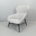 BRUNNER - A contemporary designer Ray lounge chair by Jens and Laub, the upholstered shell seat on