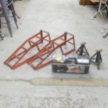 An RAC 2-tonne trolley jack, new in box, a pair of axel jacks and two painted metal car ramps.